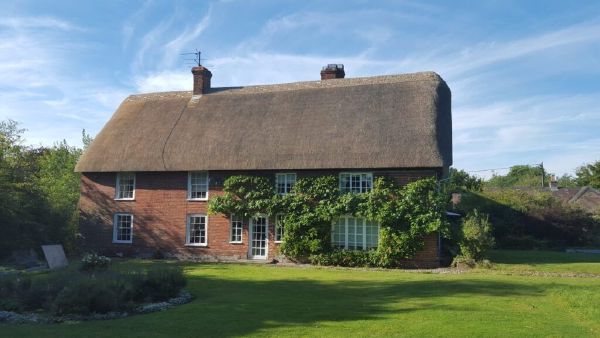 Completed ridge replacement — tight weave with decorative finish