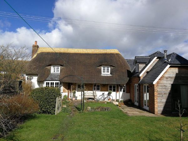 New water reed roof on a Grade II listed property