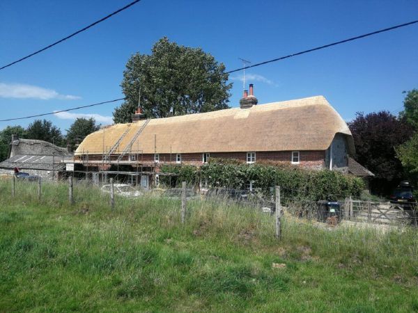 Completed re-thatch with new ridge, Marlborough Downs